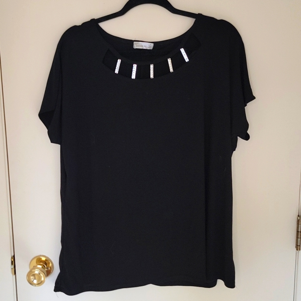 Black tunic size 1X. Very cute. Light blouse material.